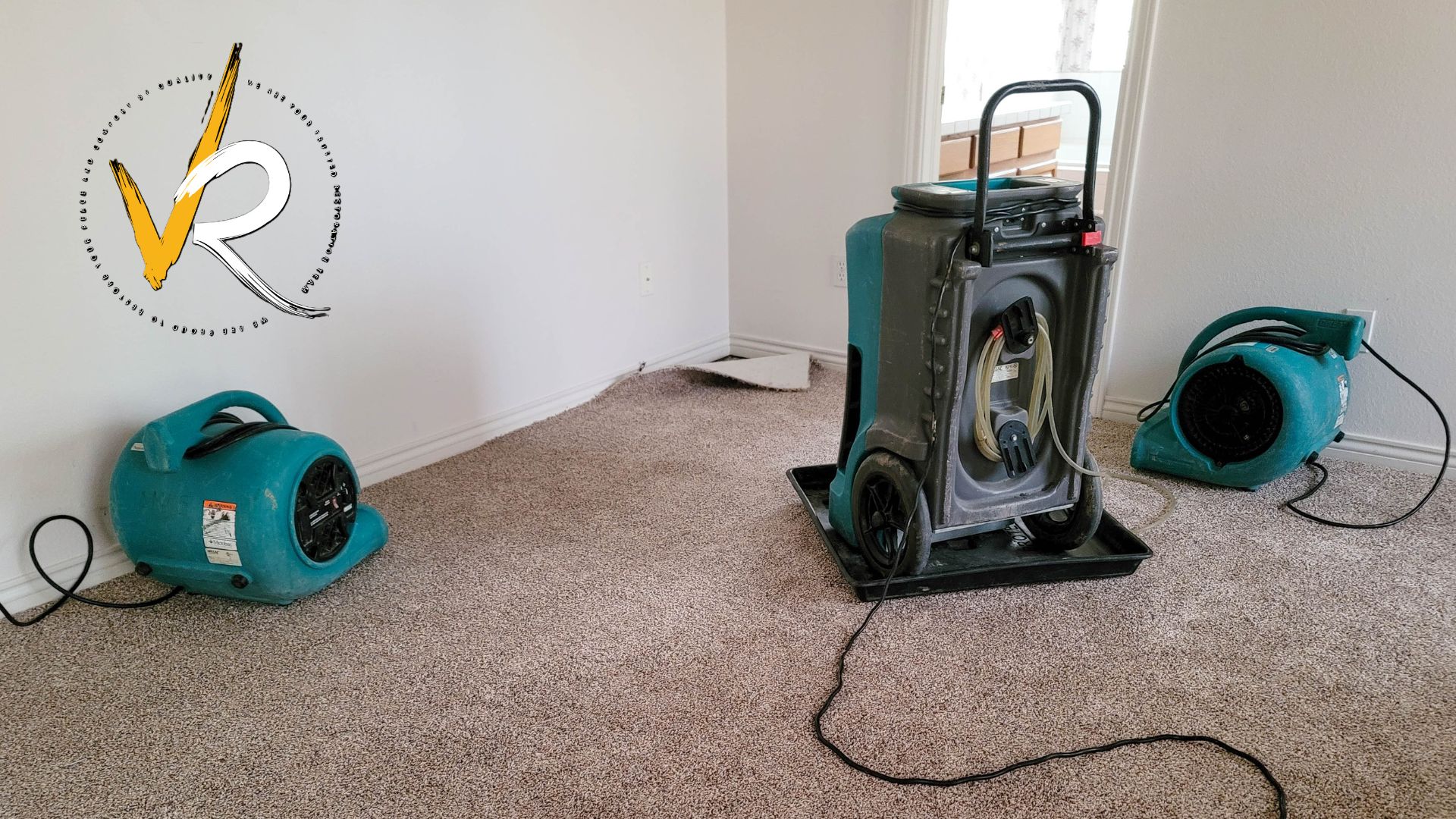 Technician using a moisture meter for wall leak detection in West Vancouver